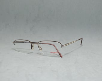 MENRAD 13127 by FMG Lunettes de vue vintage demi-cerclées de qualité supérieure NOS Jamais portées Allemagne Homme unisexe classique rectangulaire ovale étroit marron argent