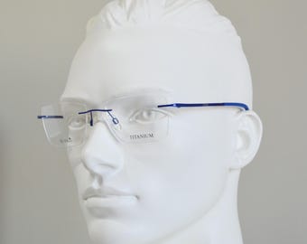 Hochwertige randlose Brille. Gestell aus reinem Titan. Neue, ausgewählte Brillen. Unisex-Brille. Rechteckig. Frankreichblau. Klassisches Design.