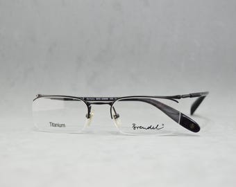 Top Titan Vintage Brille BRENDEL 908686 01 Made in Japan. NOS Urworn eckig schmal halb randlos Unisex Mann Frau Schwarz
