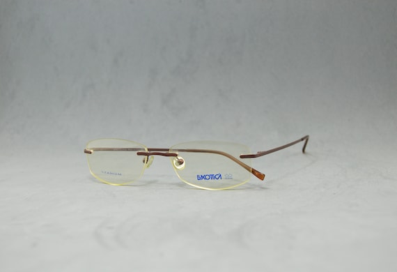 Vintage titanium Rimless EyeGlasses LUXOTTICA Coll