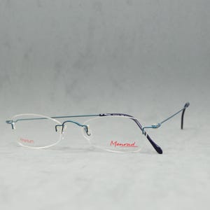 Lunettes de vue vintage sans monture marque MENRAD par FMG Nos vgt Classic ovale étroit unisexe homme femme Rx lunettes des années 80 des années 90 bleu France Acier inoxydable