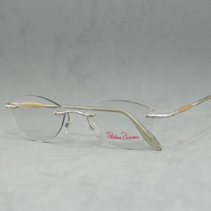Top EyeGlasses Vintage PALOMA PICASSO 8361 by Metzler Rimless NOS Unworn Oval classic eyewear regular size Woman Silver golden Light Green