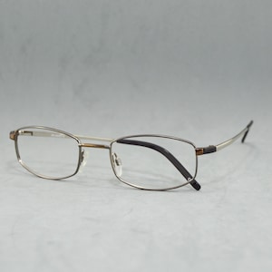 Vintage metal eyeglasses Germany 00s Eyewear NOS Unworn Classic square narrow hexagonal man gunmetal, silver, brown and black reading top