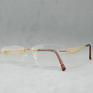 Top Titanium Vintage Rimless EyeGlasses STEPPER EX-50311 FX012. NOS. Unworn. Unisex Woman Man. 00s 2010s Rectangular. Eyewear. Golden. Carey