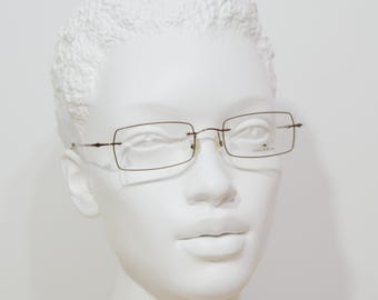 Chiaro & Scuro Vintage rimless EyeGlasses Italy NOS Unworn Classic  square rectangular Unisex man Woman 00s brown flexible Stainless steel