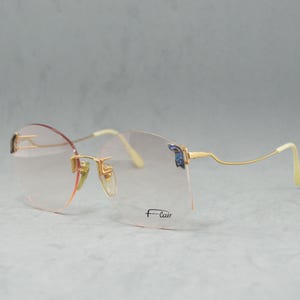 Lunettes de vue vintage sans monture FLAIR Jet Set Allemagne NOS non portées papillon Femme Rx lunettes des années 90 en acier inoxydable chirurgical OVERSIZE