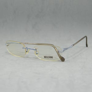 MOSCHINO 3126 Vintage Rimless Eyeglasses Italy NOS Unworn Classic square rounded oval Unisex man Woman Rx eyewear 00s light blue old fashion