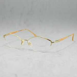 00s Carl ZEISS FMG 15371 Vintage metal Half Rimless eyeglasses Germany NOS Unworn Eyewear Classic woman oval fantasy golden colorful cream
