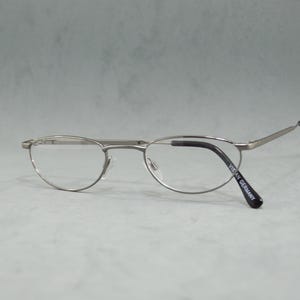 Vintage Eyeglasses VISTAN Germany NOS metal narrow oval Eyewear Specs Incluided Prescription Unisex man Woman 00s silver half-moon glasses