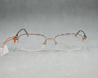 Années 00. F. MONTESINOS ALAMA 53005 34 Lunettes de vue vintage en métal sans monture. Espagne. Lunettes de vue non portées NOS Monture classique unisexe pour homme et femme. Bronze.