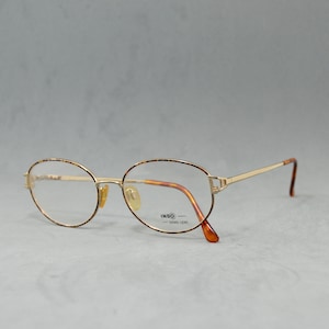 Vintage metal woman EyeGlasses INDO  Unworn. Classic woman butterfly drop marbled brown gold Rx eyewear Spain 90s NOS ols stock fashion