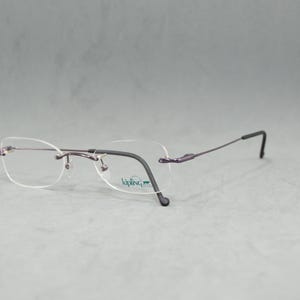 KIPLING 244 LAMY vintage lunettes de vue sans monture France NOS papillon petits classiques unisexes femme homme lunettes des années 00 noir cadre violet