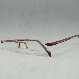 Lunettes de vue Donna Karan 3555 vintage sans monture en acétate Italie NOS jamais portées Classique carré rectangulaire unisexe homme femme années 2000 grenat brillant lunettes