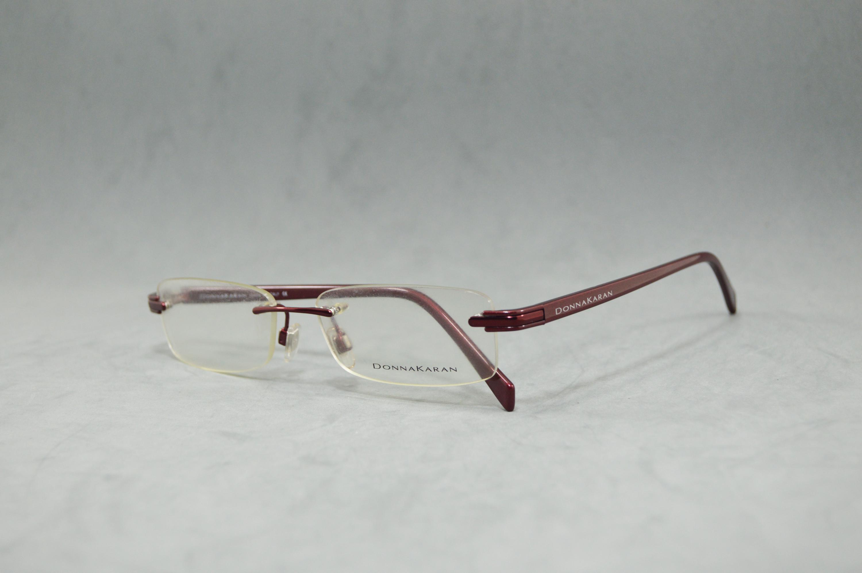 Donna Karan 3555 Vintage acetate rimless EyeGlasses Italy NOS Unworn Classic  square rectangular Unisex man Woman 00s shinny garnet eyewear