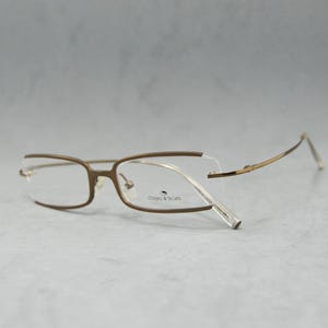 Lunettes de vue vintage sans monture Chiaro & Scuro Italie NSA jamais portées Classique carré rectangulaire unisexe homme femme des années 2000 marron flexible en acier inoxydable