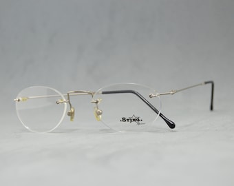 Vintage Randlose Brille STING NOS Ungetragen Klassisch Rund Unisex Mann Frau Rx Brillen 90s 00s Silber Schwarz Flexible Edelstahl