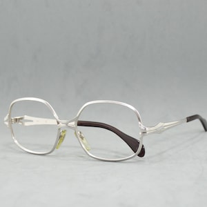 Vintage metal Eyeglasses METZLER Germany NOS Unworn Rx Eyewear Classic butterfly design no oversize frame woman silver 70s top quality frame