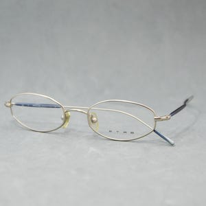 ETRO 9404 581 Vintage metal eyeglasses. ITALY 00s Eyewear. NOS Unworn Classic polygonal narrow. Regular size. Unisex Frame woman man. silver