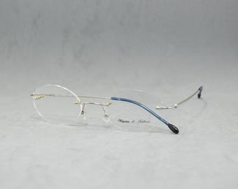 Vintage Rimless EyeGlasses Wagner & Kühner Germany NOS. Unisex man Woman Rx eyewear. Oval rounded 00s Silver blue Flexible Stainless steel