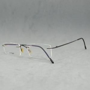 TIM DILSEN 283 Vintage Rimless Eyeglasses. Beta titanium. Dead stock. Unworn Rectangular narrow Unisex Woman man Top Quality black Elegant