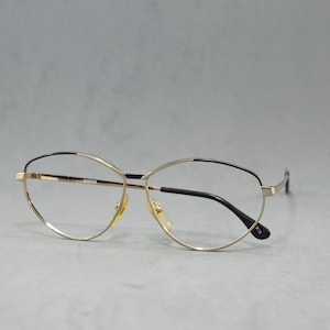 Vintage metal woman EyeGlasses XAFFER Unworn. Classic oversize woman butterfly gold and black Rx eyewear 80s NOS ols stock fashion