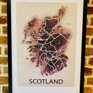 May include: A watercolor map of Scotland with various cities and towns labeled. The map is framed in black and has a white background. The map is decorated with small illustrations of animals, landmarks, and other icons.