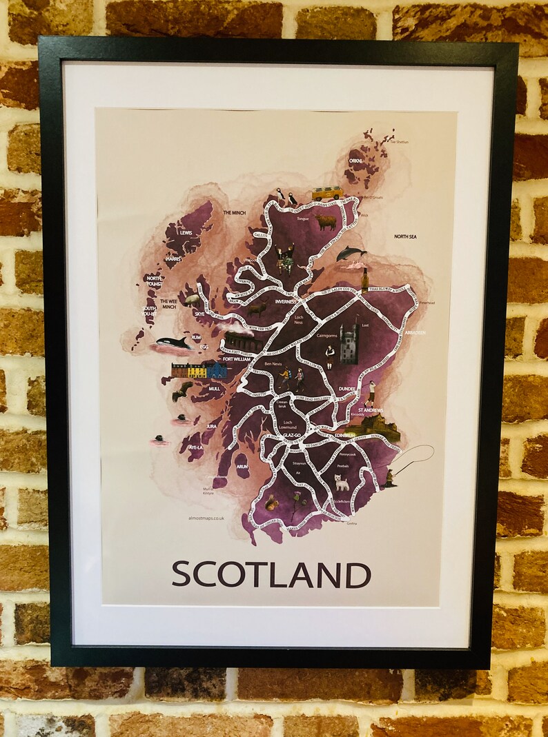 May include: A watercolor map of Scotland with various cities and towns labeled. The map is framed in black and has a white background. The map is decorated with small illustrations of animals, landmarks, and other icons.
