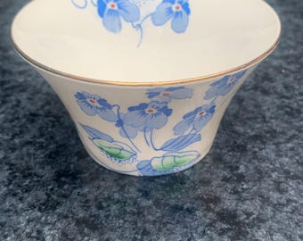 Azucarero Colclough de estilo Art Déco con diseño de pensamientos azules, una pieza rara.