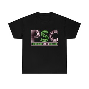 May include: Black t-shirt with a pink and green "PSC" logo, which stands for Philander Smith College.