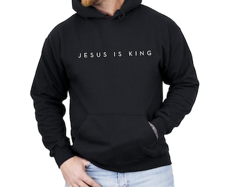 May include: Black hooded sweatshirt with the text "JESUS IS KING" in white lettering.