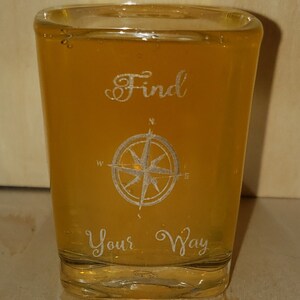 a 1.5 oz. shot glass with the saying &quot;find your way&quot;