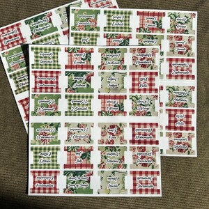 May include: Sheets of Bible book labels with floral and gingham patterns. Each label features a book name, such as Genesis or Psalms, in a clear font. The labels are in red, green, and white.