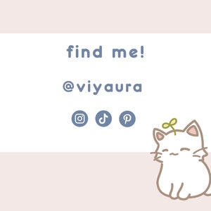 May include: White card with the text "find me! @viyaaura" and social media icons for Instagram, TikTok, and Pinterest. A white cartoon cat with a green plant on its head is sitting below the card.