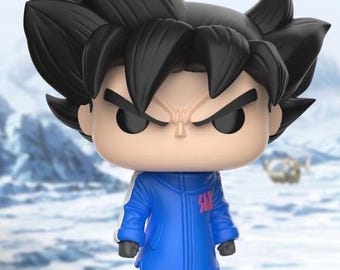 May include: A blue and white anime character figurine with black hair and a determined expression. The figurine is wearing a blue jacket with white accents and orange pants. The figurine is standing on a white cloud-shaped base.