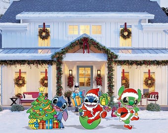 May include: Three Christmas-themed Stitch characters from the Disney movie Lilo & Stitch. The characters are dressed as Santa Claus, an elf, and a regular Stitch holding a Christmas tree. The characters are standing in front of a white house decorated for Christmas.