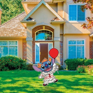 May include: A blue and orange Stitch character dressed as a clown holding a red balloon in front of a house with a red brick facade.