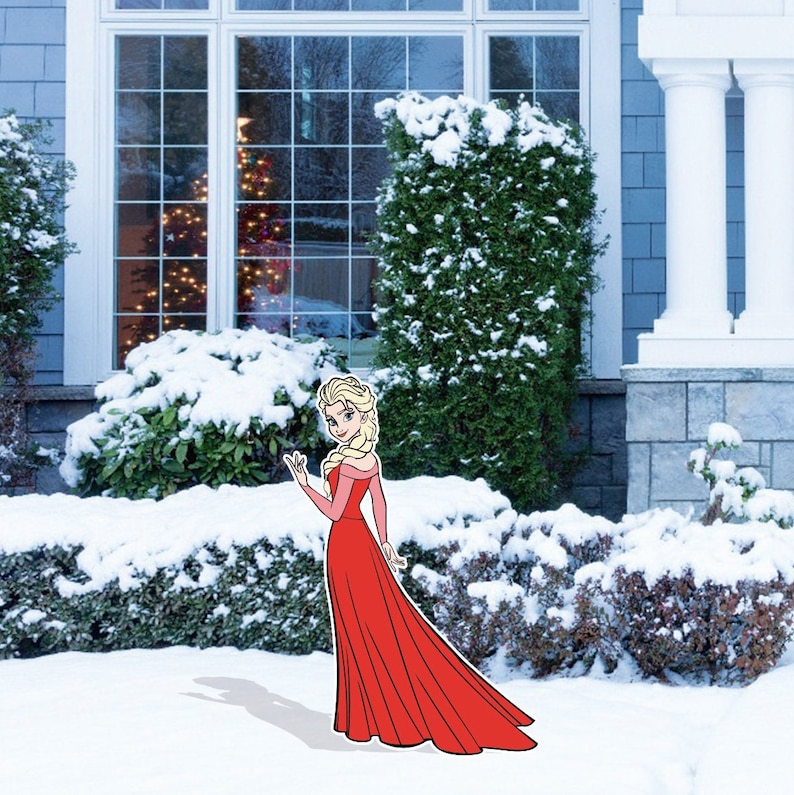 May include: A cartoon illustration of a woman in a red dress standing in a snowy yard. The woman has blonde hair and is wearing a red dress with a white collar. The yard is covered in snow and there are bushes in the background.