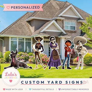 May include: A set of custom yard signs featuring colorful cartoon characters including a dog, a skeleton in a hat, a skeleton in a purple dress, a young boy in a red jacket, and a skeleton in a white mariachi outfit, displayed on a green lawn.
