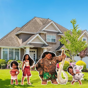 May include: A set of five Moana-themed cardboard cutouts featuring Maui, Moana, Pua the pig, and two other characters. The cutouts are standing in front of a house with a green lawn.