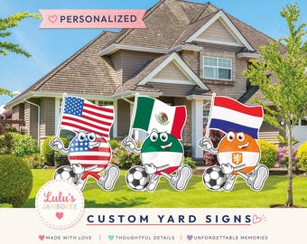 May include: Three custom yard signs featuring cartoon characters with soccer balls and flags of the United States, Mexico, and the Netherlands. Each character holds a flag and stands on a soccer ball. Text includes Personalized, Lulu's Jamboree, and Custom Yard Signs.