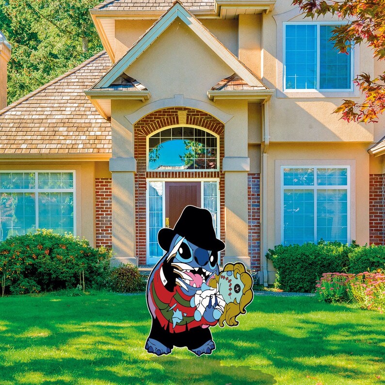 May include: A blue and red cartoon character dressed as a horror movie villain holding a doll. The character is standing in front of a house with a green lawn.