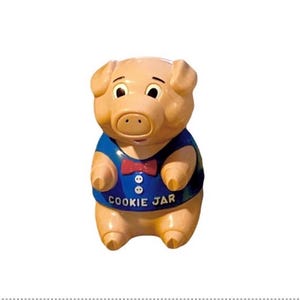 May include: A white ceramic mug with a black handle and the text "But First, Coffee" in a bold, black font. The mug is sitting on a wooden surface. The mug is approximately 4 inches tall.