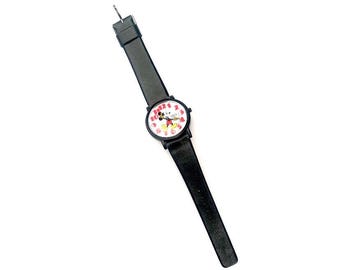 May include: A wristwatch with a black strap and a round white face featuring a graphic of a cartoon mouse character in red shorts and yellow shoes. The dial has red numerical hour markers arranged in a circle around the central character illustration.