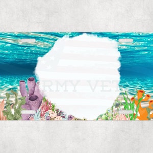 May include: A blue and green underwater scene with coral, seaweed, and a white circle in the center. The background is a blue ocean with light blue waves.