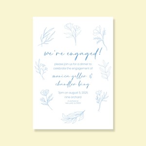 May include: An engagement announcement card with a cream background and blue floral illustrations. The text "we're engaged!" is at the top, followed by details about a dinner to celebrate Monica Geller & Chandler Bing's engagement.