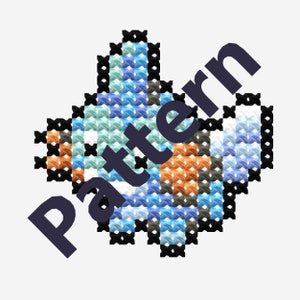 Op de afbeelding: Een kruissteekpatroon van een blauwe, oranje en witte vis met zwarte contouren. Het patroon is in de rechterbovenhoek met "Pattern" gelabeld.