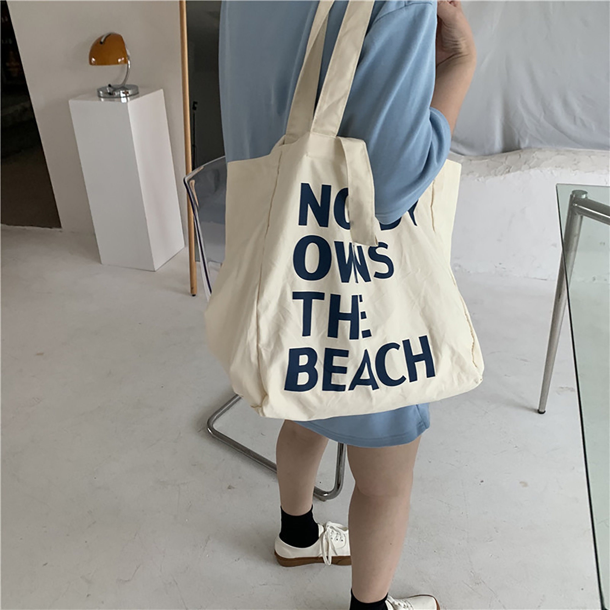 Reclaimed Vintage inspired clear plastic tote bag with logo canvas inner