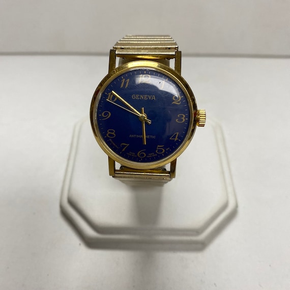 r830 Vintage Geneva Men Gold Blue Dial Stretch Ba… - image 1