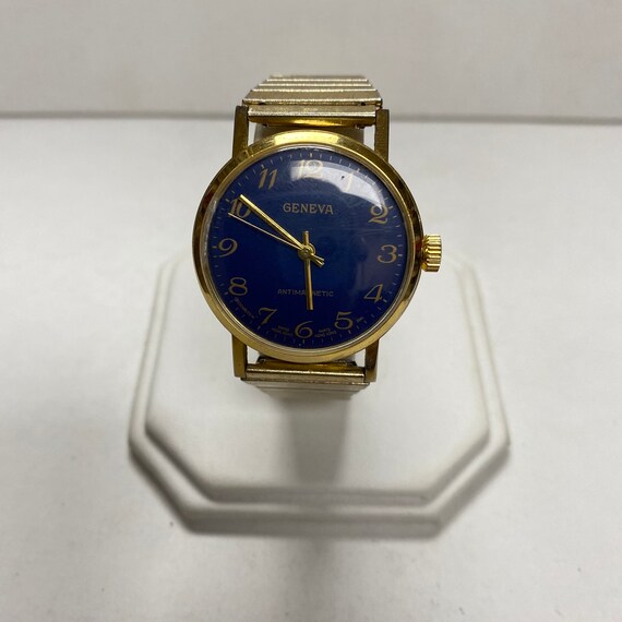 r830 Vintage Geneva Men Gold Blue Dial Stretch Ba… - image 1