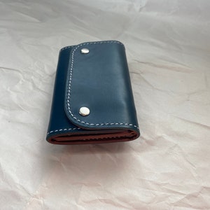 Cartera azul a presión